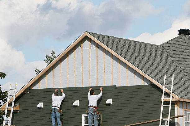 Professional Siding Contractor technician working in Commerce City, CO